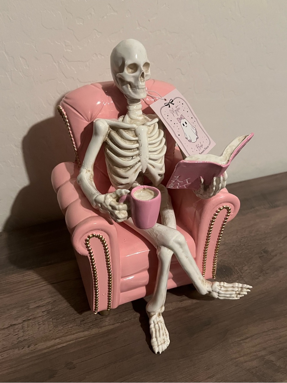 Pink Skeleton Figurine in Chair Reading Book Coffee Mug Halloween Resin Decor